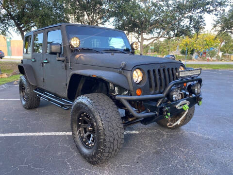 2013 Jeep Wrangler Unlimited for sale at BIG BOY DIESELS in Fort Lauderdale FL