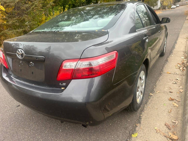 2008 Toyota Camry for sale at JUST AUTOS in MINNEAPOLIS, MN