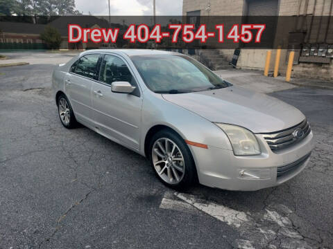 2009 Ford Fusion for sale at WIGGLES AUTO SALES INC in Mableton GA