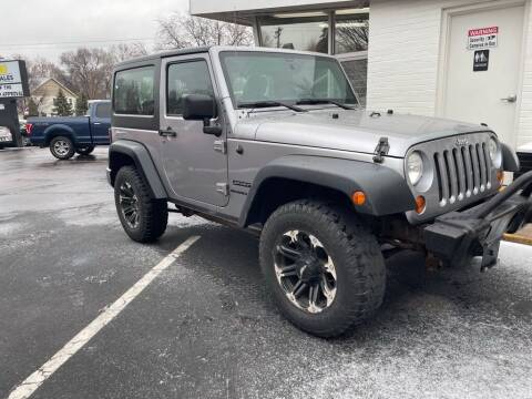 2013 Jeep Wrangler for sale at Chinos Auto Sales in Crystal MN