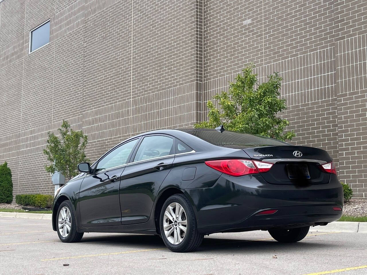 2013 Hyundai SONATA for sale at Phoenix Motor Co in Romulus, MI