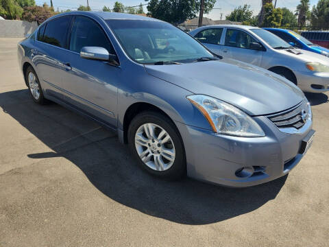 2011 Nissan Altima for sale at COMMUNITY AUTO in Fresno CA