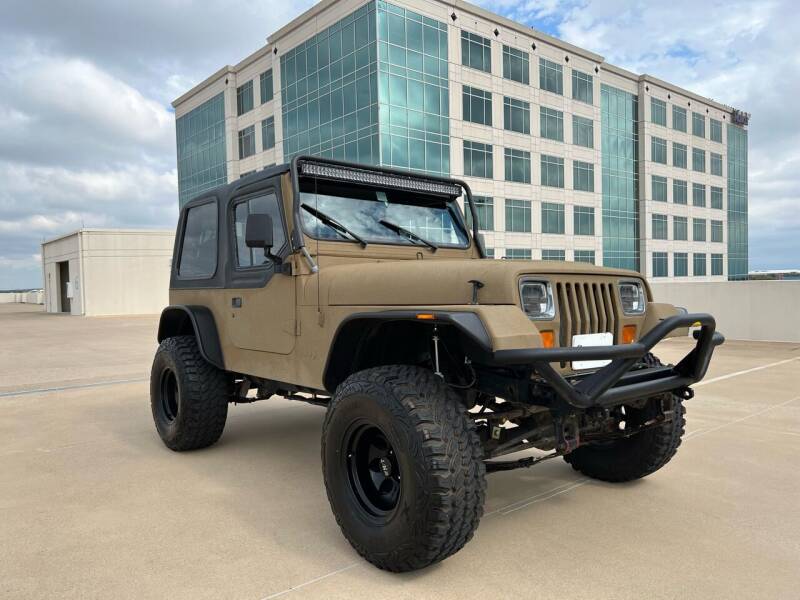 1995 Jeep Wrangler for sale at Signature Autos in Austin TX