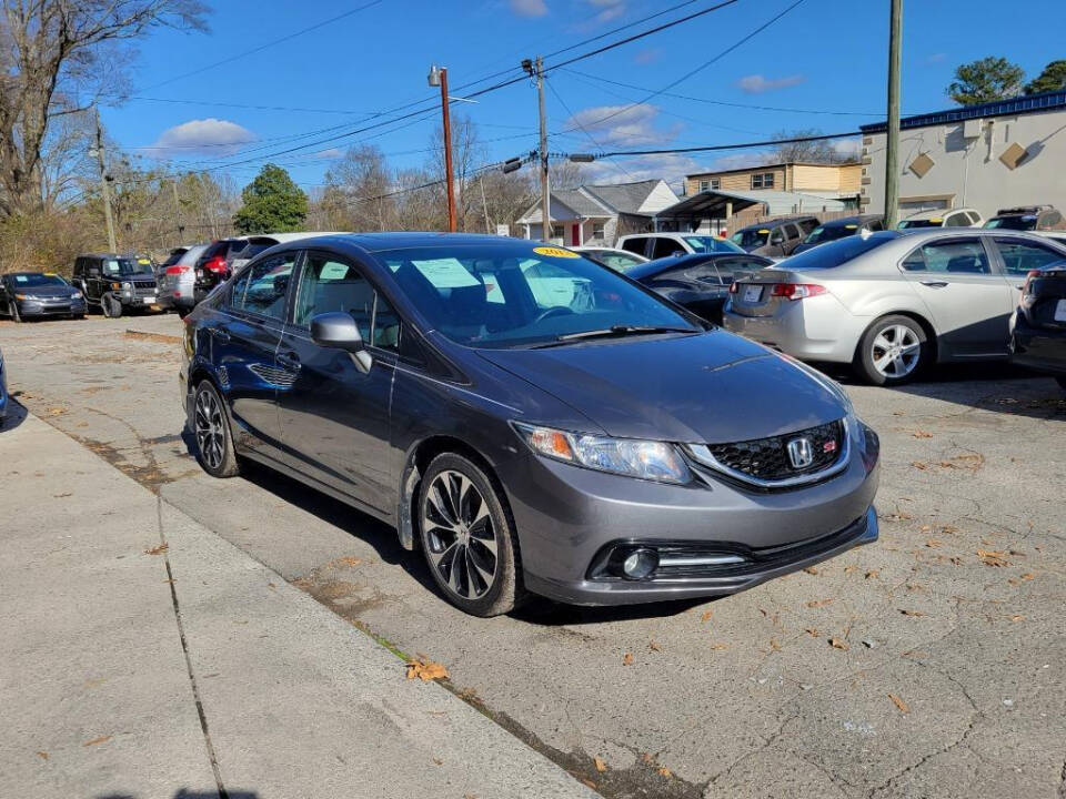 2013 Honda Civic for sale at DAGO'S AUTO SALES LLC in Dalton, GA