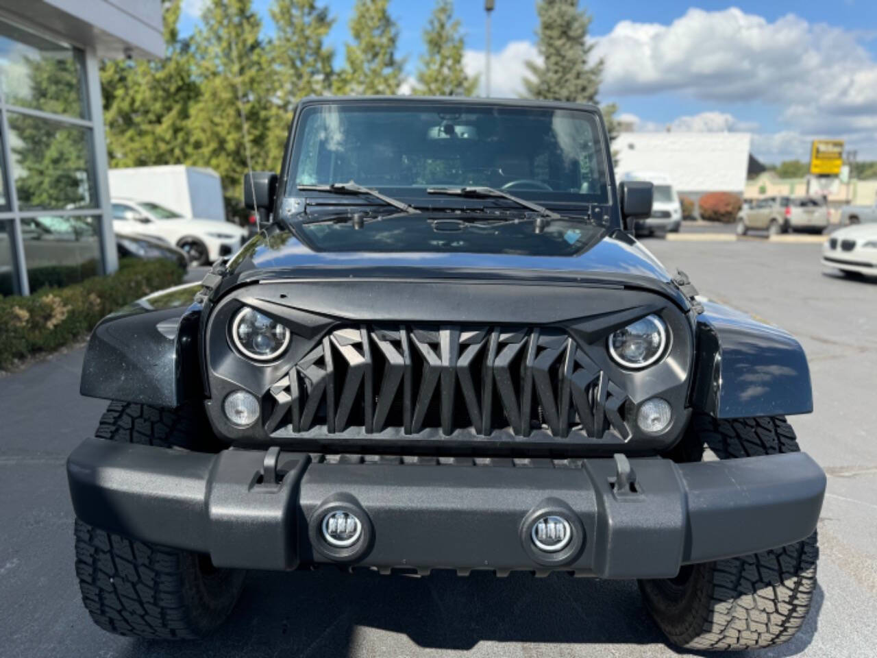 2014 Jeep Wrangler Unlimited for sale at Opus Motorcars in Utica, MI