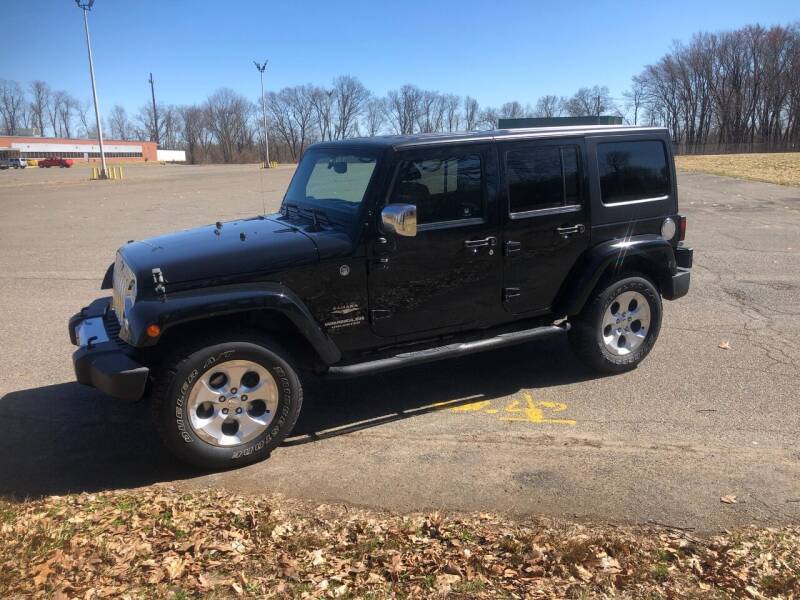 2013 Jeep Wrangler Unlimited for sale at Chris Auto South in Agawam MA