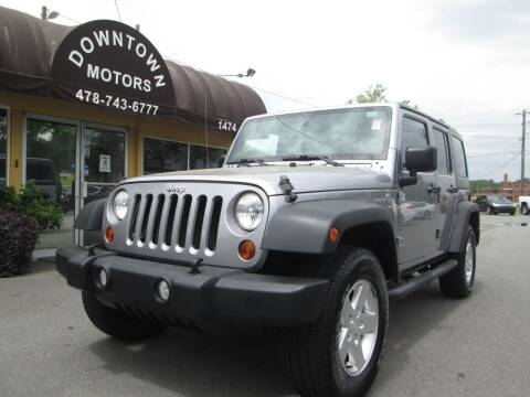 2013 Jeep Wrangler Unlimited for sale at DOWNTOWN MOTORS in Macon GA