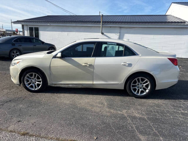 2013 Chevrolet Malibu for sale at DECKER AUTO SALES in Bay City, MI