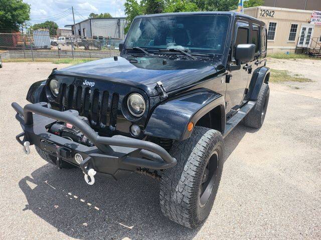 2014 Jeep Wrangler Unlimited for sale at XTREME DIRECT AUTO in Houston TX