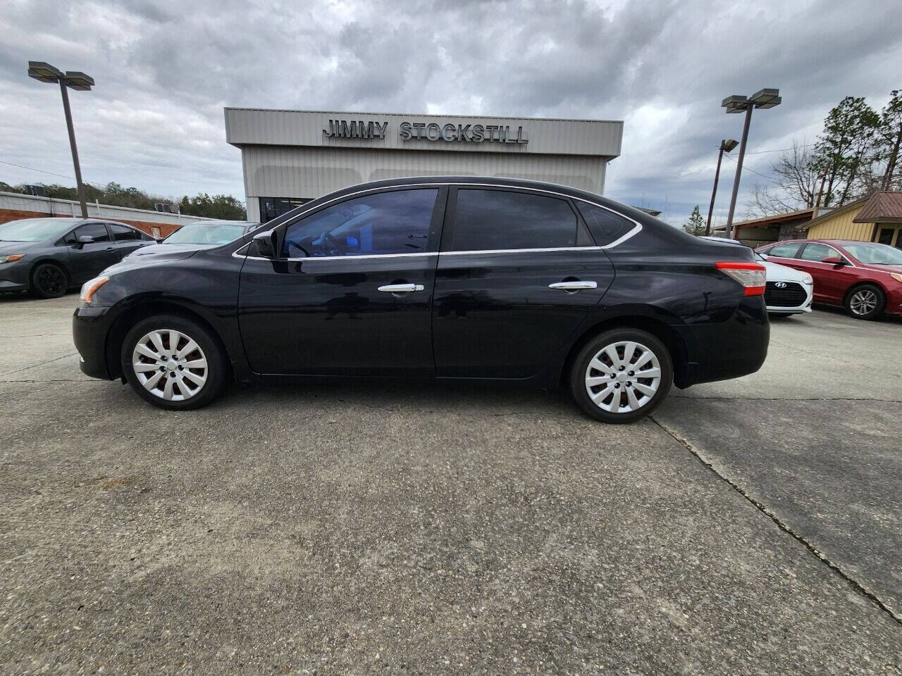 2013 Nissan Sentra for sale at Small Town Auto in Picayune, MS