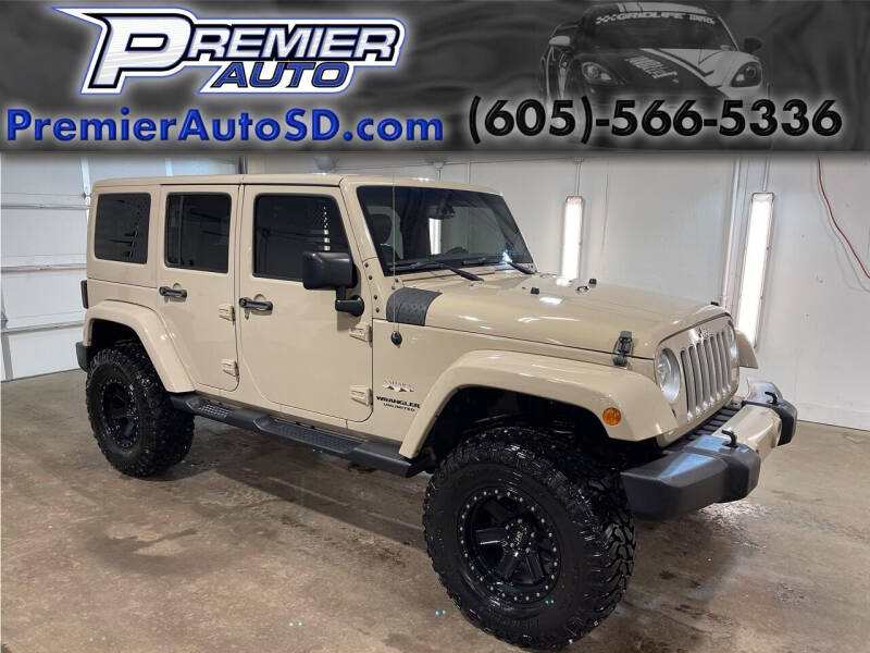 2016 Jeep Wrangler Unlimited for sale at Premier Auto in Sioux Falls SD