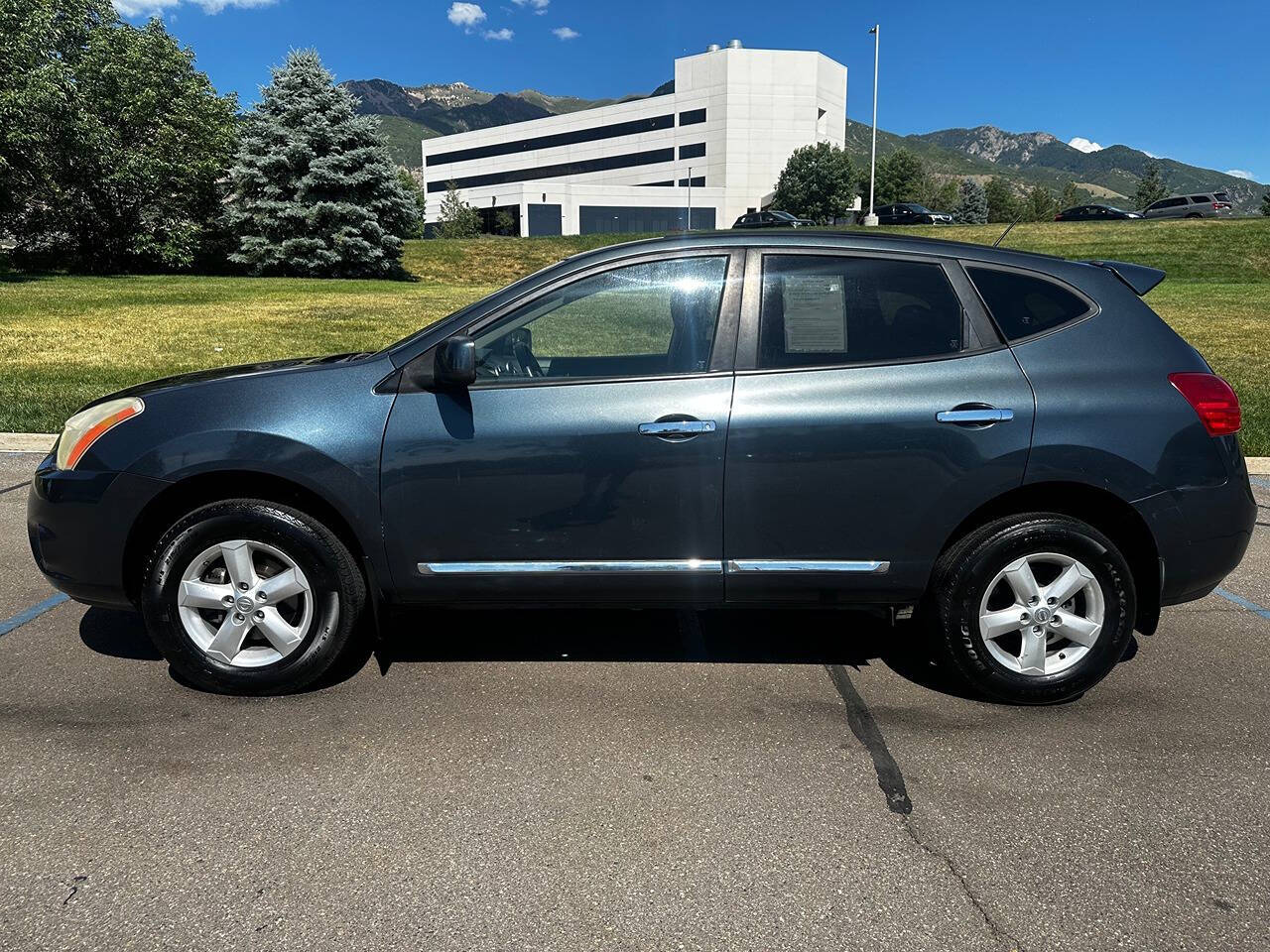 2013 Nissan Rogue for sale at DRIVE N BUY AUTO SALES in OGDEN, UT