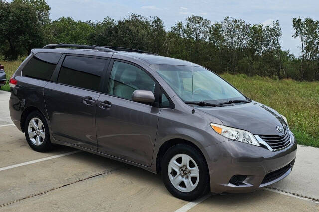 2013 Toyota Sienna for sale at CAR MARKET AUTO GROUP in Sugar Land, TX