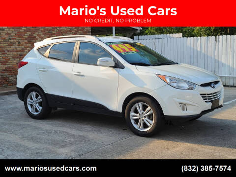 2013 Hyundai Tucson for sale at Mario's Used Cars - South Houston Location in South Houston TX
