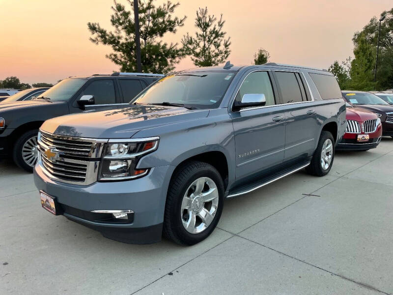 2016 Chevrolet Suburban for sale at Azteca Auto Sales LLC in Des Moines IA