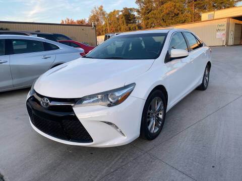 2015 Toyota Camry for sale at Delta Auto Sales in Marietta GA