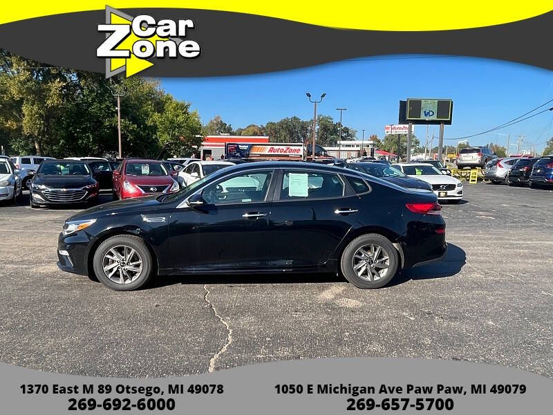 2019 Kia Optima for sale at Car Zone in Otsego MI