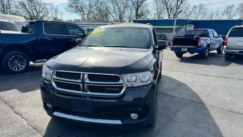 2013 Dodge Durango for sale at Jerry & Menos Auto Sales in Belton MO