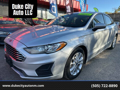 2019 Ford Fusion Hybrid for sale at Duke City Auto LLC in Gallup NM