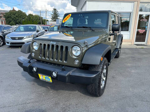 2015 Jeep Wrangler Unlimited for sale at ADAM AUTO AGENCY in Rensselaer NY