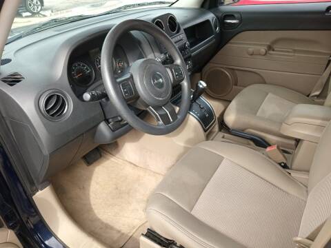 2014 Jeep Patriot for sale at Taylor Trading Co in Beaumont TX