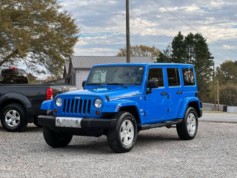 2011 Jeep Wrangler Unlimited for sale at H and S Auto Group in Canton GA