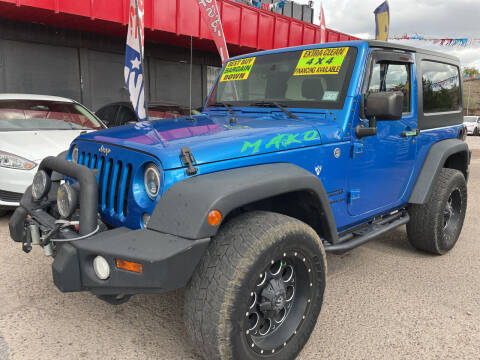 2015 Jeep Wrangler for sale at Duke City Auto LLC in Gallup NM