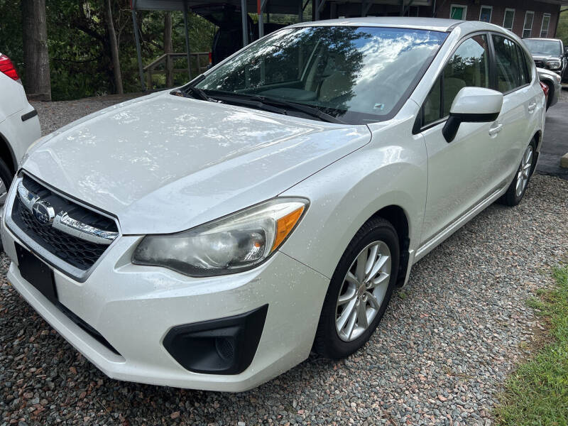 2013 Subaru Impreza for sale at R C MOTORS in Vilas NC