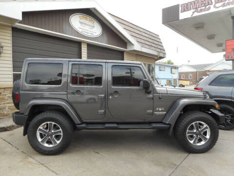 2016 Jeep Wrangler Unlimited for sale at River City Auto Center LLC in Chester IL