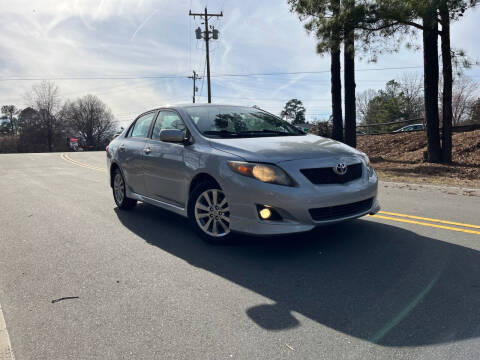 2009 Toyota Corolla for sale at THE AUTO FINDERS in Durham NC