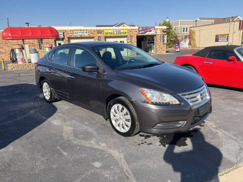 2013 Nissan Sentra for sale at Carney Auto Sales in Austin MN