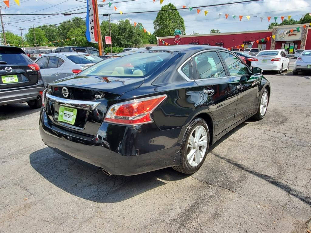 2015 Nissan Altima for sale at DAGO'S AUTO SALES LLC in Dalton, GA