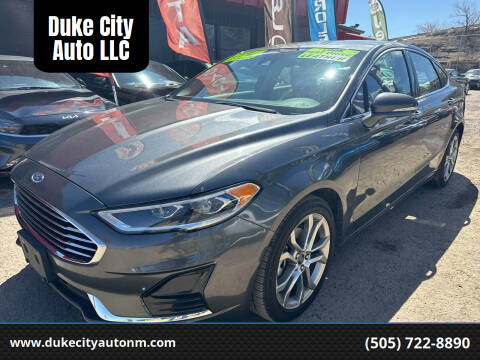 2019 Ford Fusion for sale at Duke City Auto LLC in Gallup NM