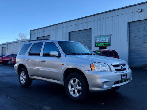 2005 Mazda Tribute for sale at DASH AUTO SALES LLC in Salem OR
