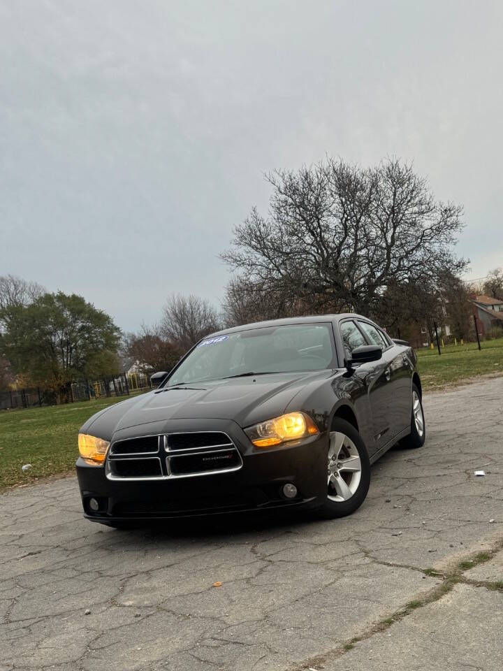 2012 Dodge Charger for sale at H & H AUTO GROUP in Detroit, MI