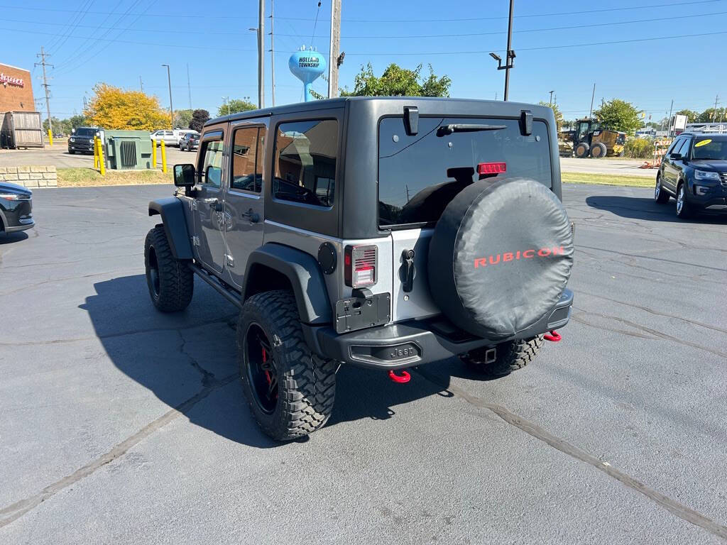 2013 Jeep Wrangler Unlimited for sale at Wyrick Auto Sales & Leasing Inc in Holland, MI