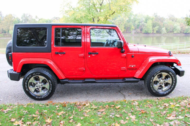 Used 2016 Jeep Wrangler Unlimited Sahara with VIN 1C4BJWEG0GL330860 for sale in Terre Haute, IN