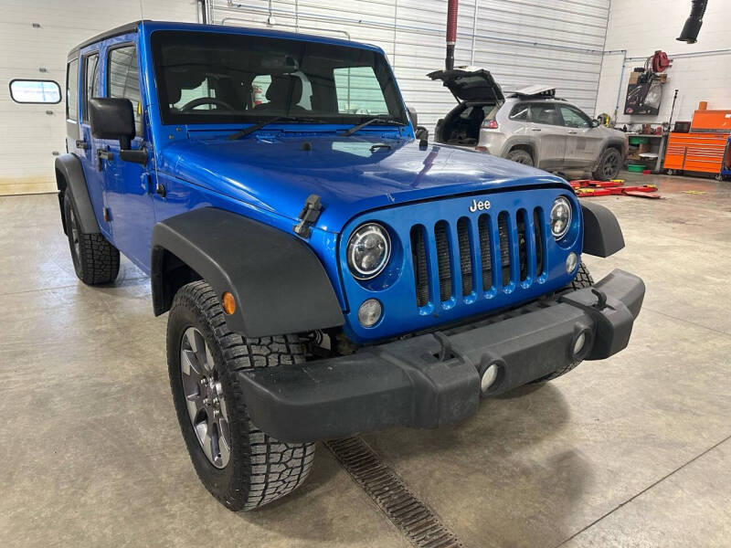 2015 Jeep Wrangler Unlimited for sale at Postal Pete in Galena IL