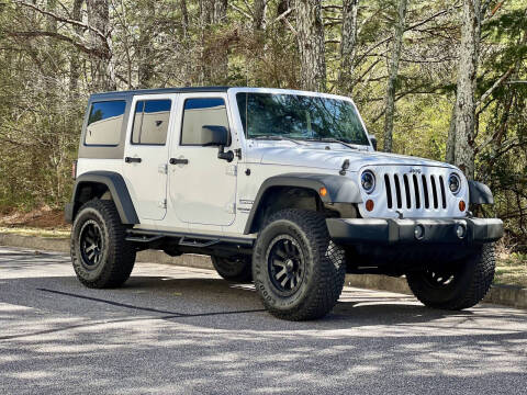 2011 Jeep Wrangler Unlimited for sale at H and S Auto Group in Canton GA