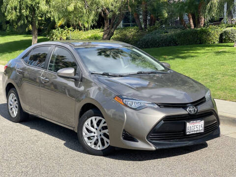 2018 Toyota Corolla for sale at MILLENNIUM MOTORS in Van Nuys CA