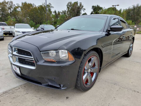 2014 Dodge Charger for sale at Texas Capital Motor Group in Humble TX