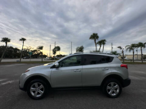 2014 Toyota RAV4 for sale at DESIGN MOTORWERKS in Port Saint Lucie FL