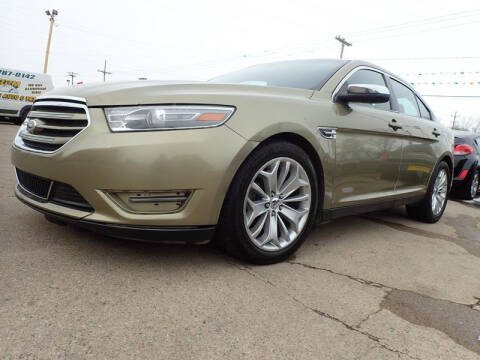 2013 Ford Taurus for sale at RPM AUTO SALES in Lansing MI