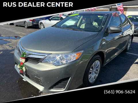 2014 Toyota Camry for sale at RUS DEALER CENTER in Lake Worth FL