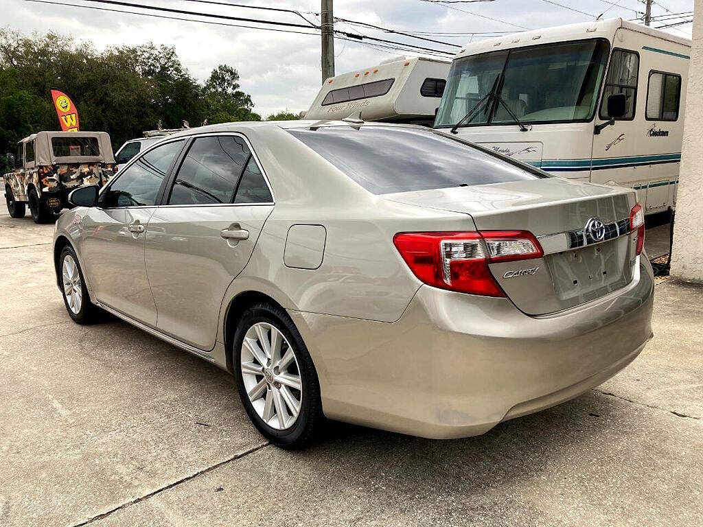 2014 Toyota Camry for sale at We Buy & Sell Cars Inc in Orlando, FL