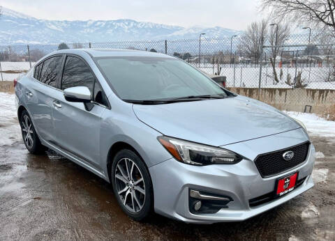 2017 Subaru Impreza for sale at The Car-Mart in Bountiful UT