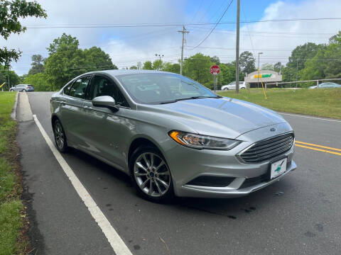 2017 Ford Fusion Hybrid for sale at THE AUTO FINDERS in Durham NC