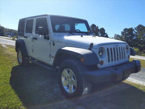 2011 Jeep Wrangler Unlimited for sale at Town Auto Sales LLC in New Bern NC