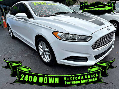 2014 Ford Fusion for sale at RIVERSIDE MOTORCARS INC - Main Lot in New Smyrna Beach FL