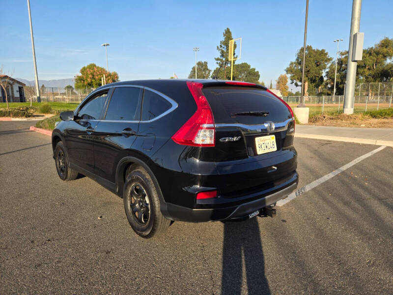 2015 Honda CR-V for sale at E and M Auto Sales in Bloomington CA